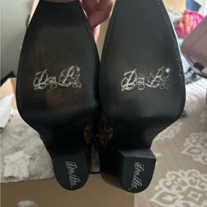 Women’s size 7 Dan Post boots. Never worn. Brand new with tags.